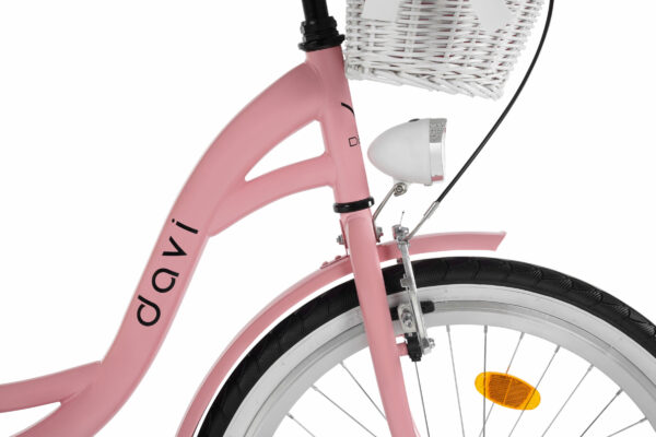 Rosa cykel med vit korg och reflex