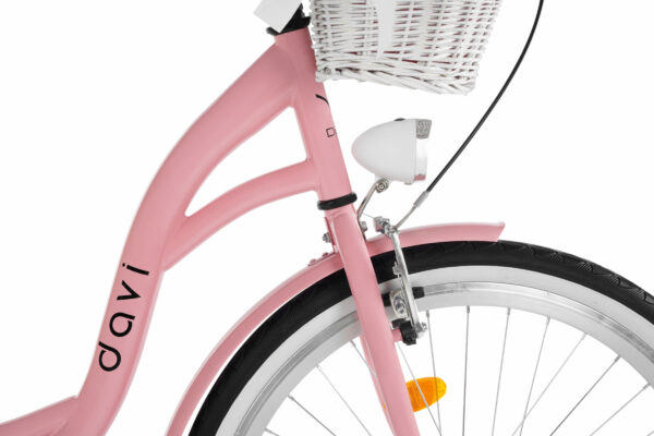 Rosa cykel med vit korg och strålkastare