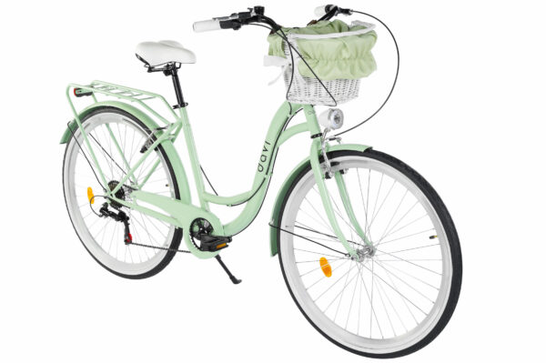 Grön cykel med korg och vita detaljer