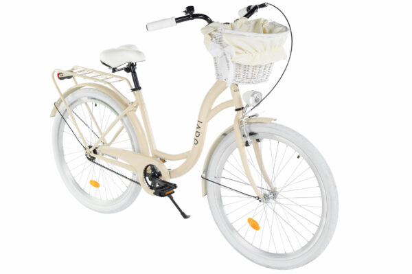 Stilren beige damcykel med korg och pakethållare