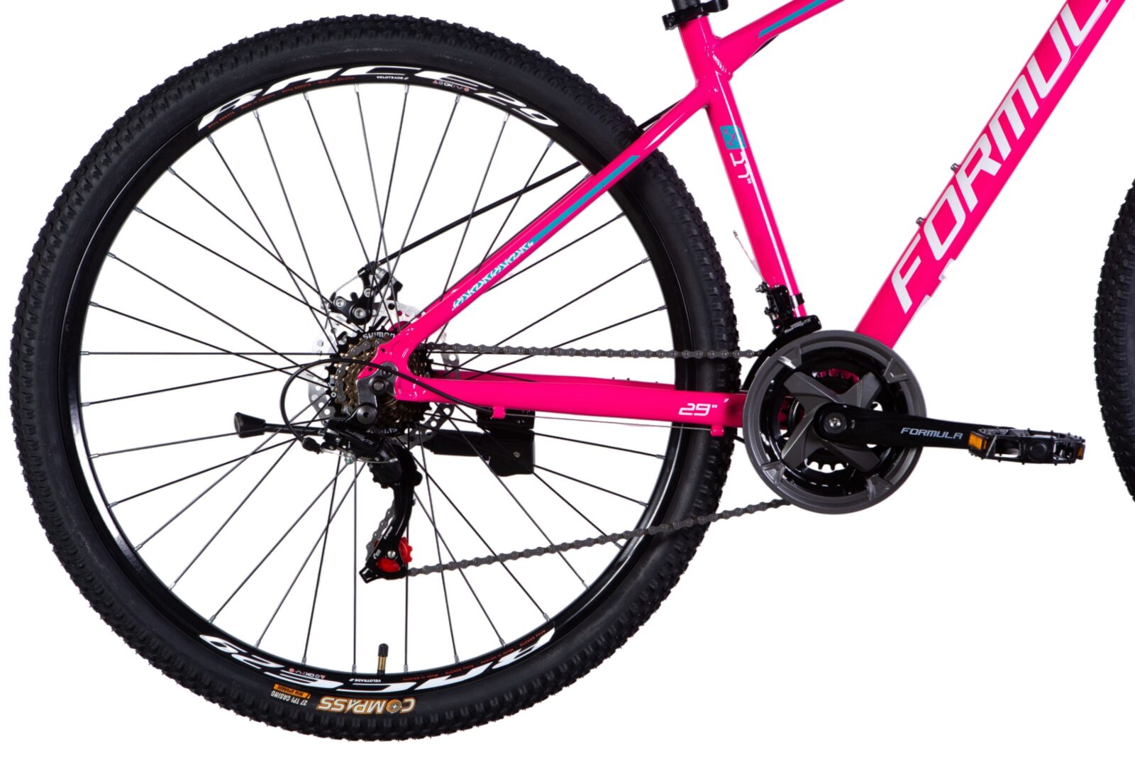 Rosa mountainbike, närbild på bakhjulet.