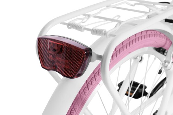 Cykel baklyse och vit pakethållare med rosa däck.