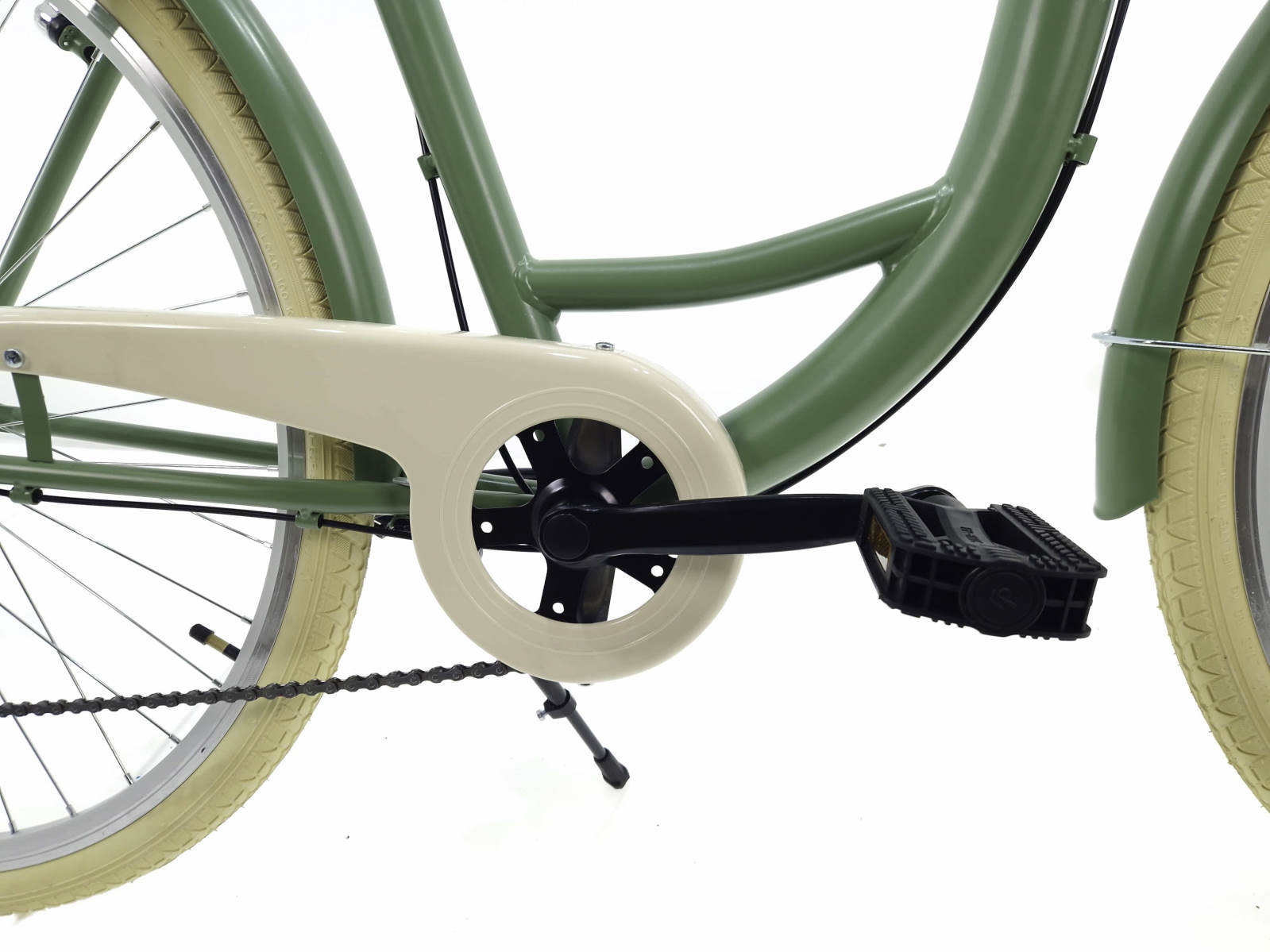 Detail pedálu zeleného jízdního kola